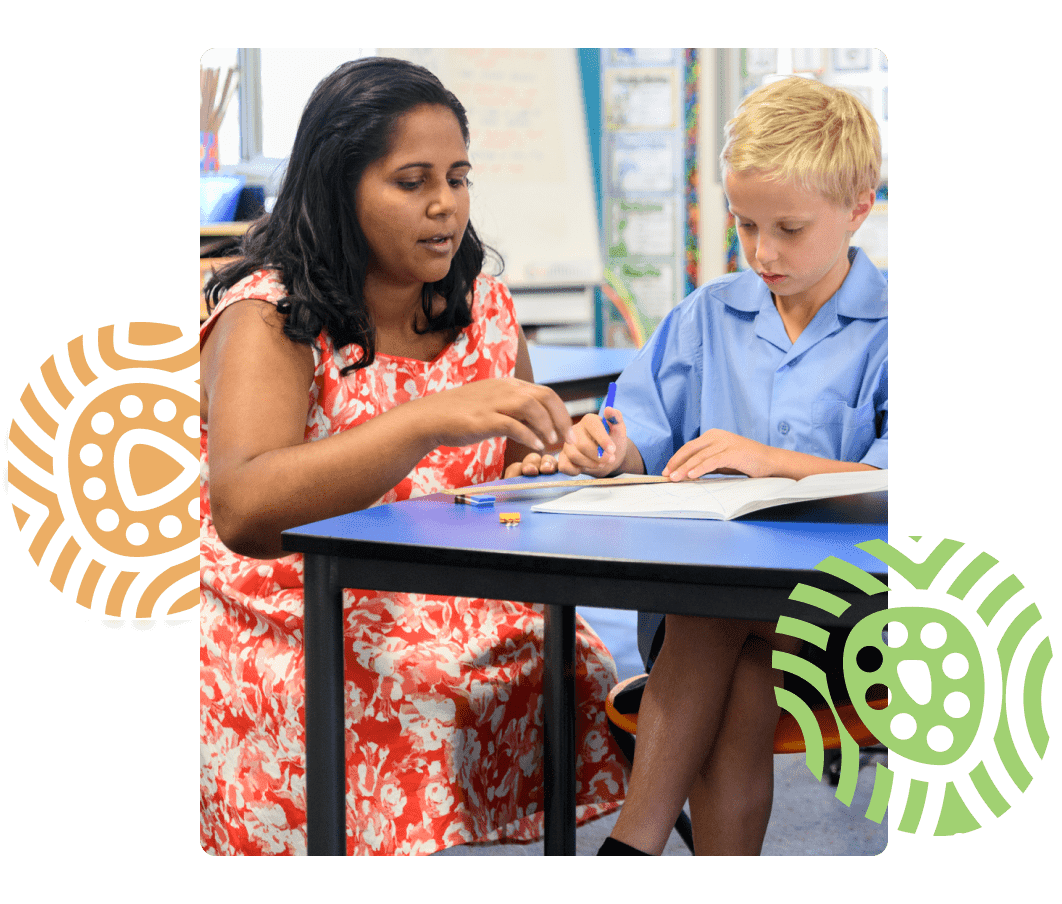 landing page image #1 Teacher works with student