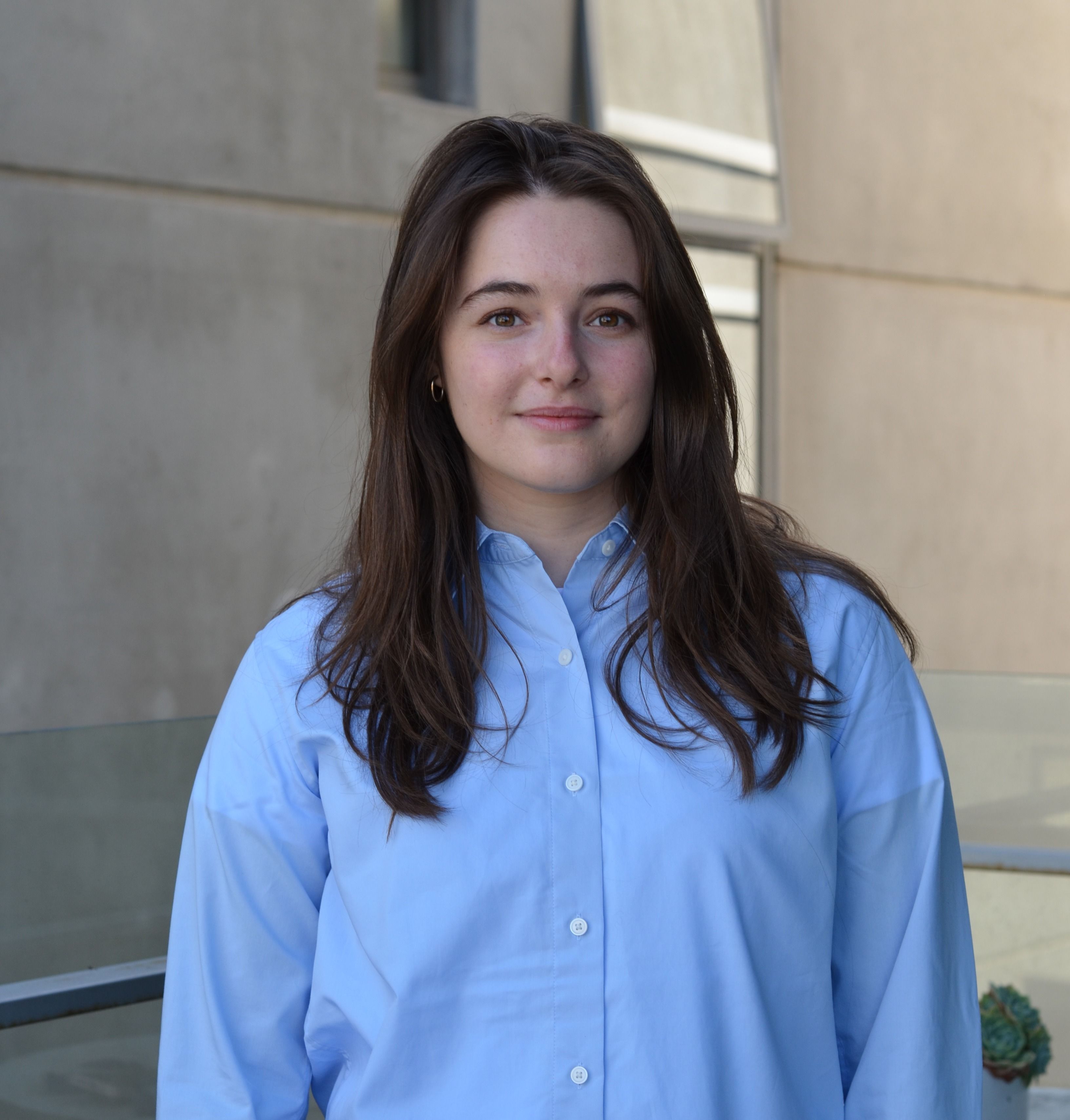 India Murphy Headshot India Murphy in blue shirt