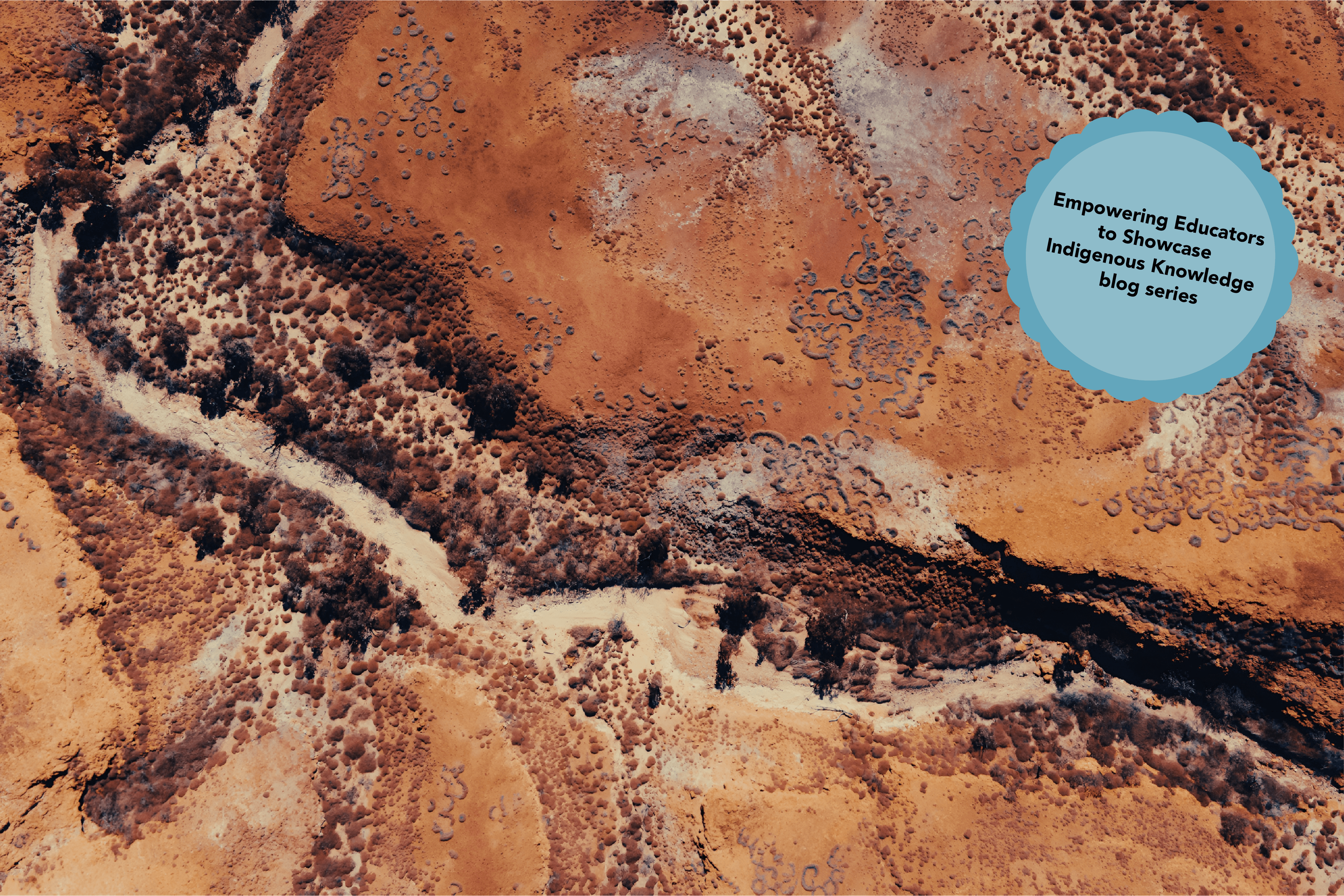 Aerial View of Desert Terrain With Red Rocks and Dirt Textures & Patterns. Pilbara Region, Western Australia. Photographer: Swift Hound Media. Source: Getty Images. Used under licence. Aerial View of Desert Terrain With Red Rocks and Dirt Textures & Patterns with blue sticker and black text reading empowering educators to showcase Indigenous perspectives blog series