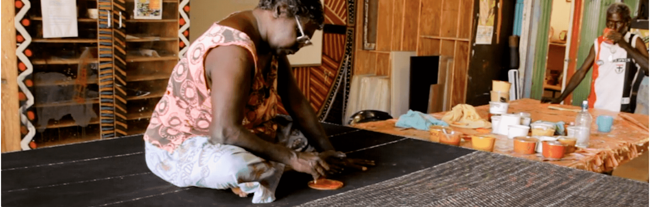 Organising ideas #2 dot painting  Woman doing large dot paining