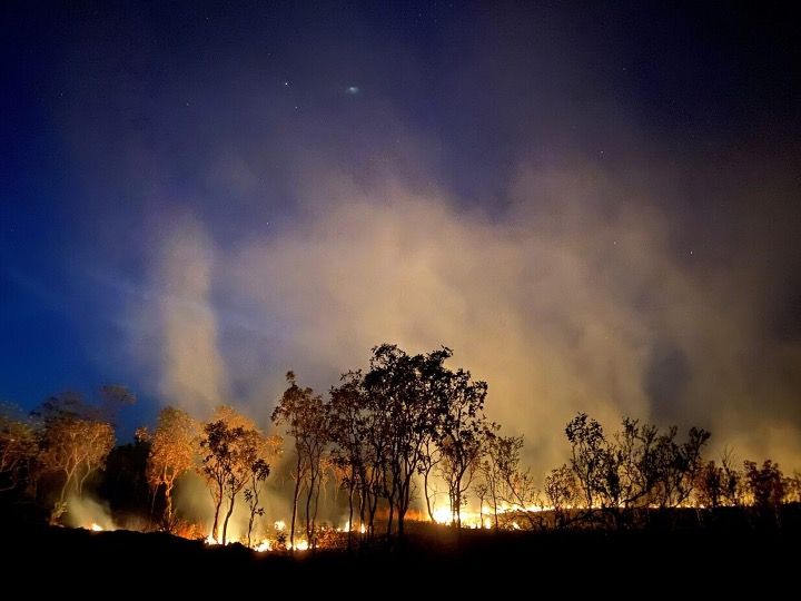 Night Burning. Mornington Island, Lardil country. Photographer: Joe Sambono. Source: Ngarrngga. © Joe Sambono 2023. Used with permission Control fire burn with night sky. Mornington Island, Lardil country