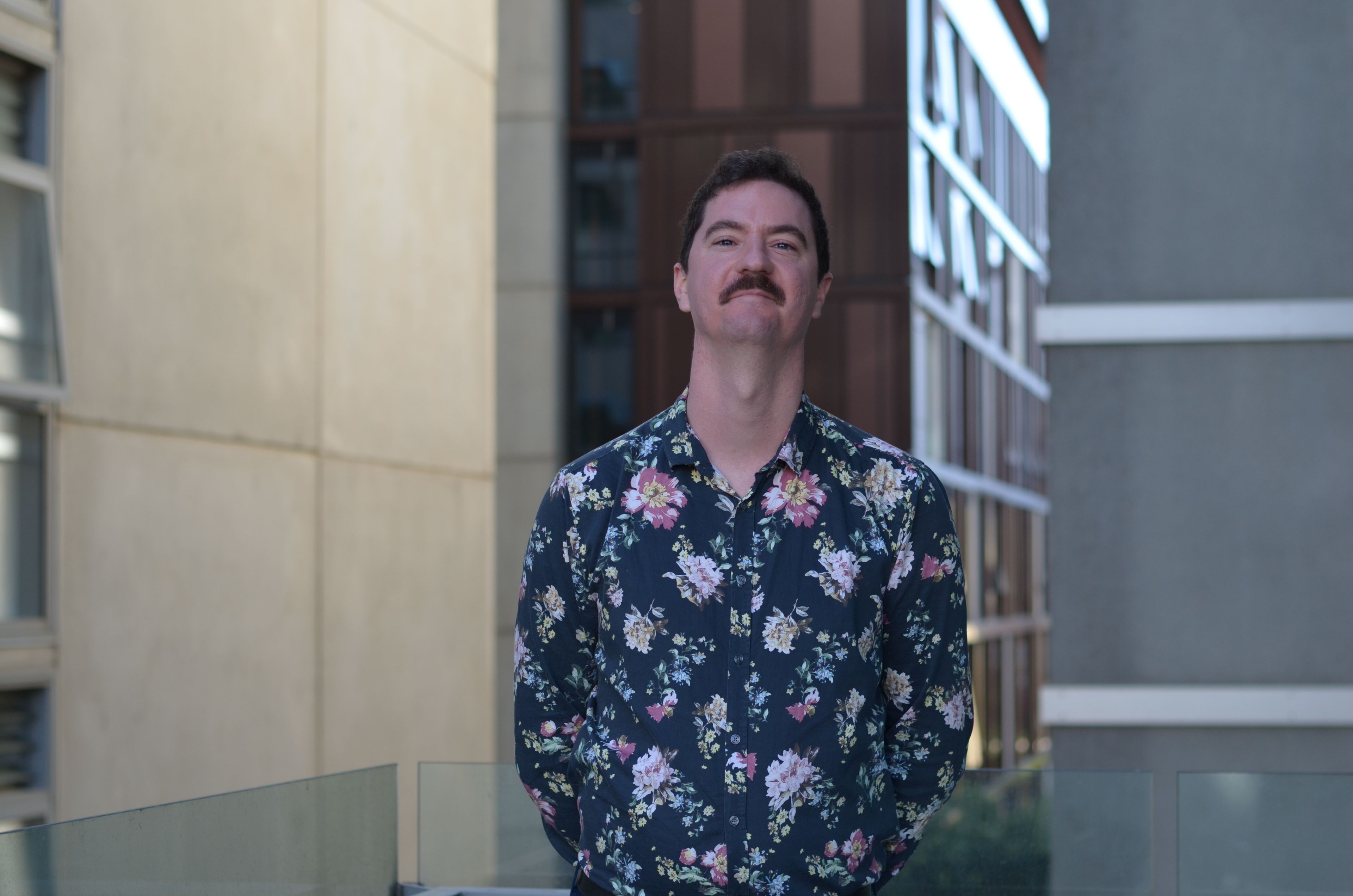 Steven Kolber Headshot Headshot of steven kolber in a pink shirt at University of Melbourne