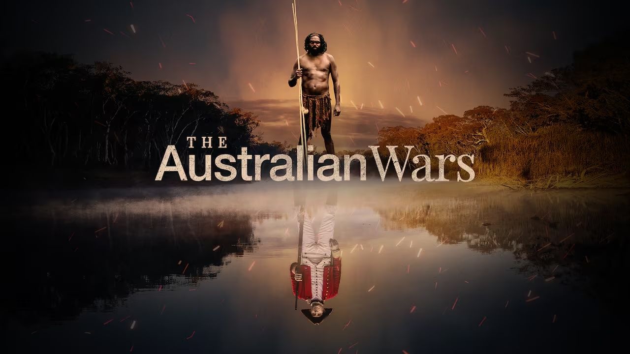 The Australian Wars Panel Image Text of The Australian Wars, Aboriginal man stands by water in his reflection is a British solider